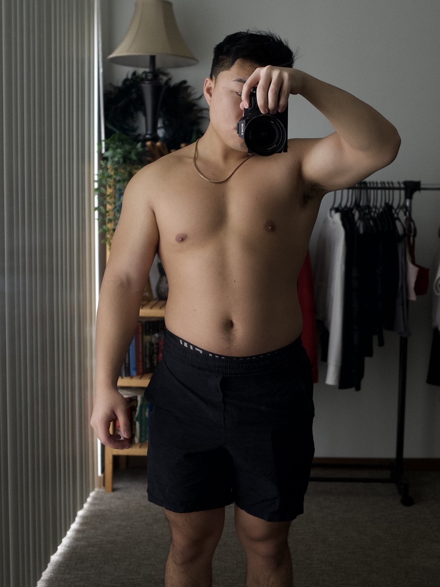 Zack overweight, taking a mirror photo